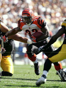 Rudi Johnson of the Cincinnati Bengals in whites.