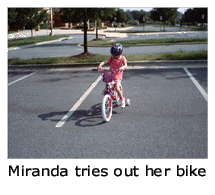 Miranda tries out her bike