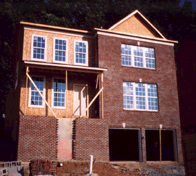 Our new house with most of the brick installed.