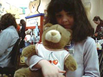 Mirand holds her newly-built bear.