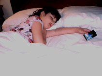 Miranda sleeping with the Day After Tomorrow clock in her hand