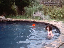 Miranda in an irregularly shaped pool