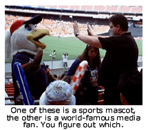 Glory, Washington Freedom mascot, with Martin Morse Wooster. Caption reads: One of these is a sports mascot, the other is a world-famous media fan. You figure out which.