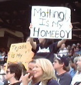 Girl holding up a sign saying Mattingly is my homeboy