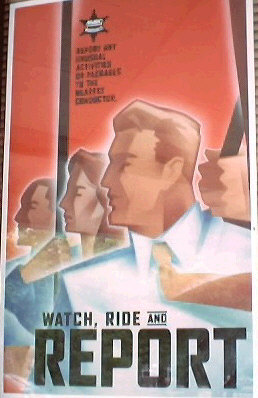 Sign reads: Report any unusual activities or packages to the nearest conductor. Watch, Ride and Report
