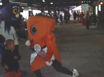 Rip Tide, a muppet-like monster of the Norfolk Tides and Chris P. Carrot, a giant carrot from PETA